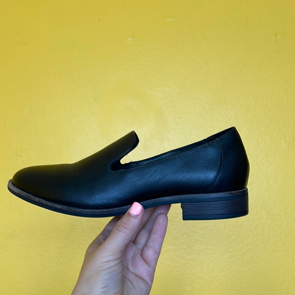 Clarks black slip on flats